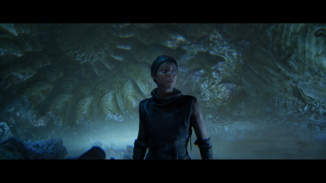 Senua standing in a cavern in Hellblade 2.