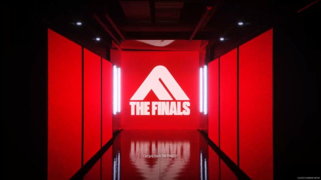 A hallway with screens lit up in red with THE FINALS logo.