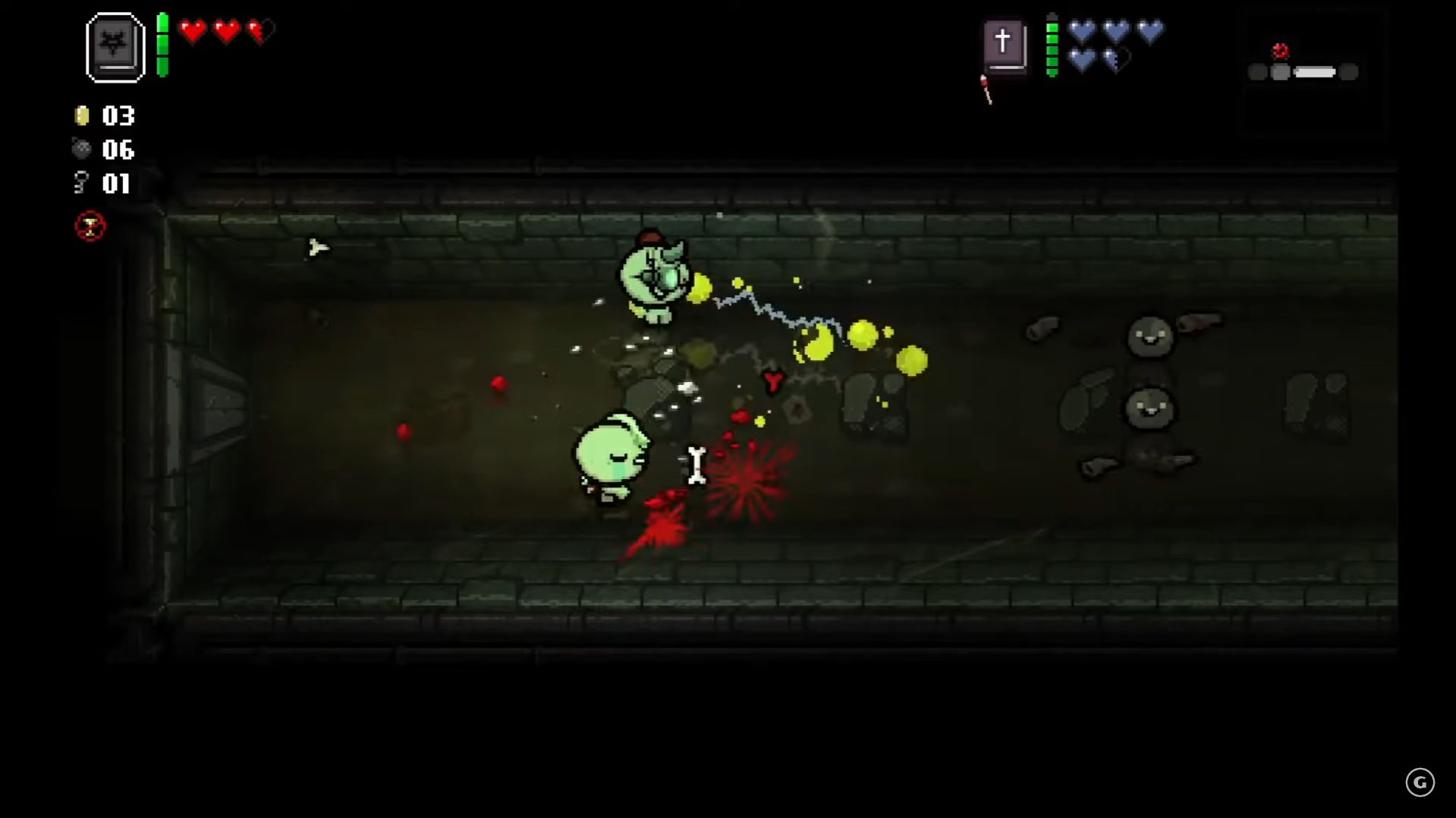 Image of local co-op in The Binding of Isaac with two players working together to kill enemies.
