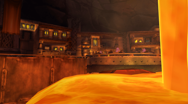 The Great Forge in Ironforge, featuring the gryphon masters and a flowing lava path