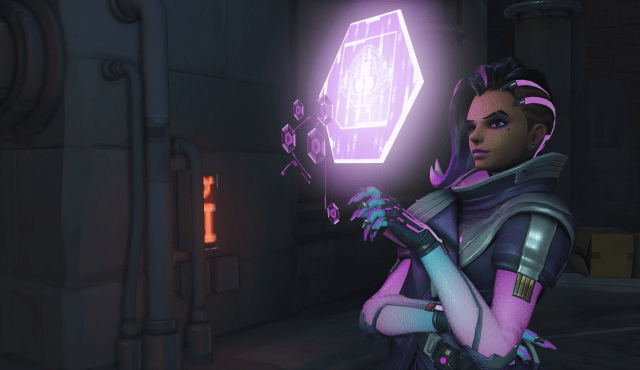 Sombra standing and hacking in her interface
